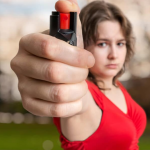 Women Using Pepper Spray