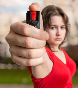 Women Using Pepper Spray